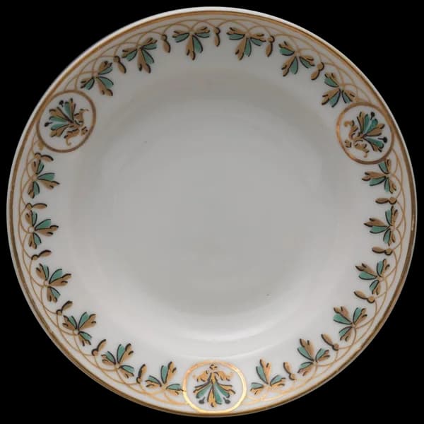 White plate with a green garland border