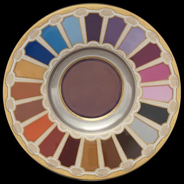 Porcelain saucer with a ring of colour samples